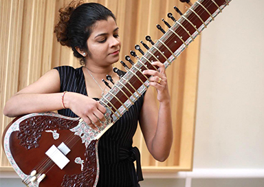 Performer playing guitar