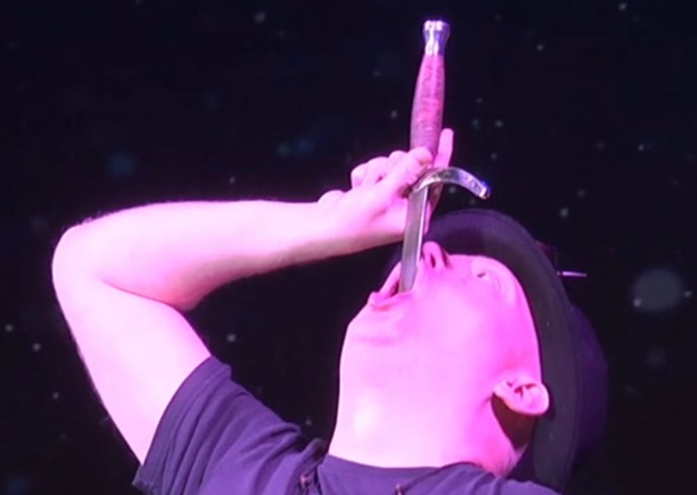 The Sword Swallower - Sword Swallower and Sideshow Performer