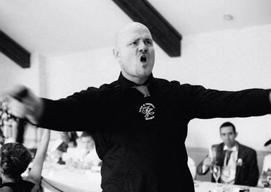 Singing waiter performing